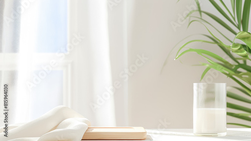 background consisting of a green fern leaf  a white board on the table
