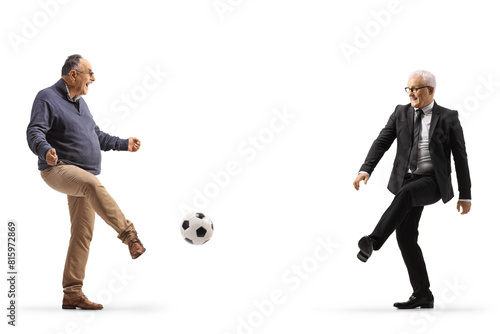 Businessman and a casual mature men playing football