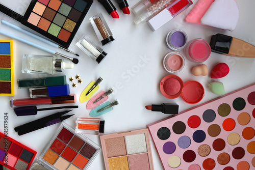Various colorful beauty products on white background. Top view.