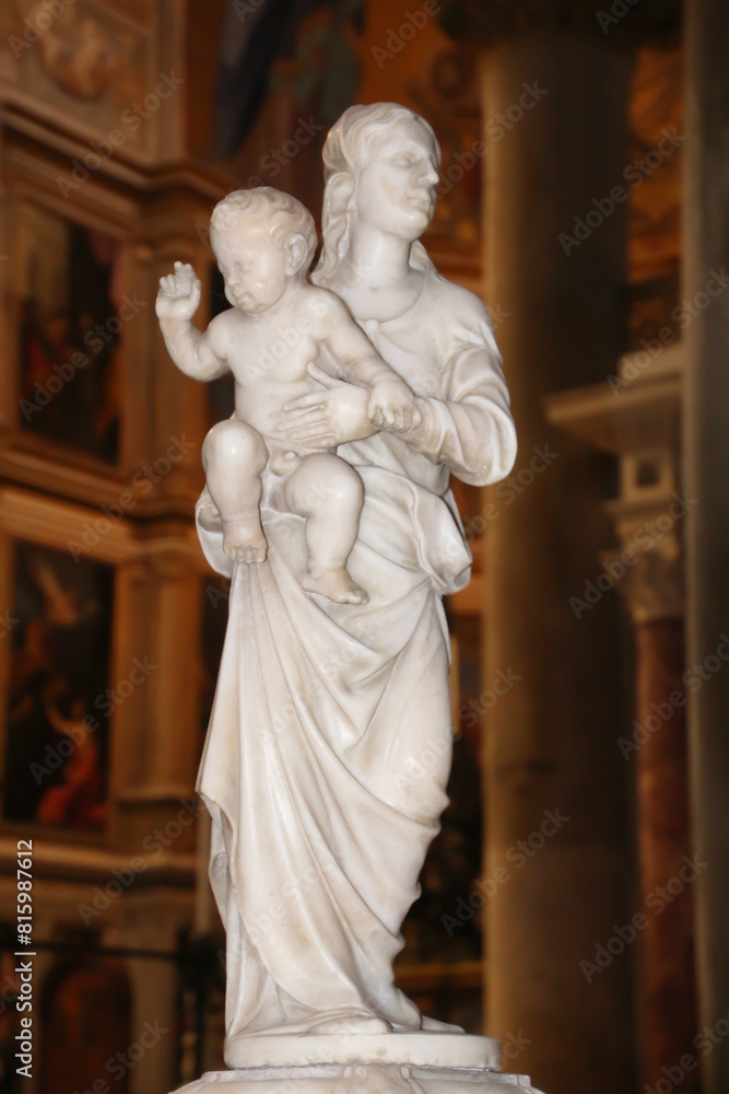 Marble Madonna figure in the Cathedral of Santa Maria Assunta in Pisa, Tuscany, Italy Marble Madonna figure in the Cathedral of Santa Maria Assunta in Pisa, Tuscany, Italy