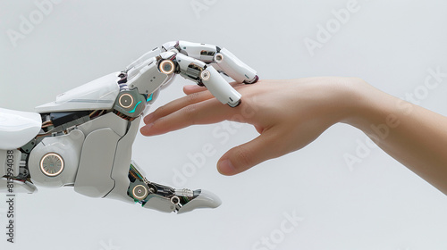 Human hand interacting with robotic arm in modern technology setting