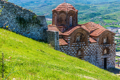 A view down the side of Saint Theodores Church in the castle above the city of Berat, Albania in summertime