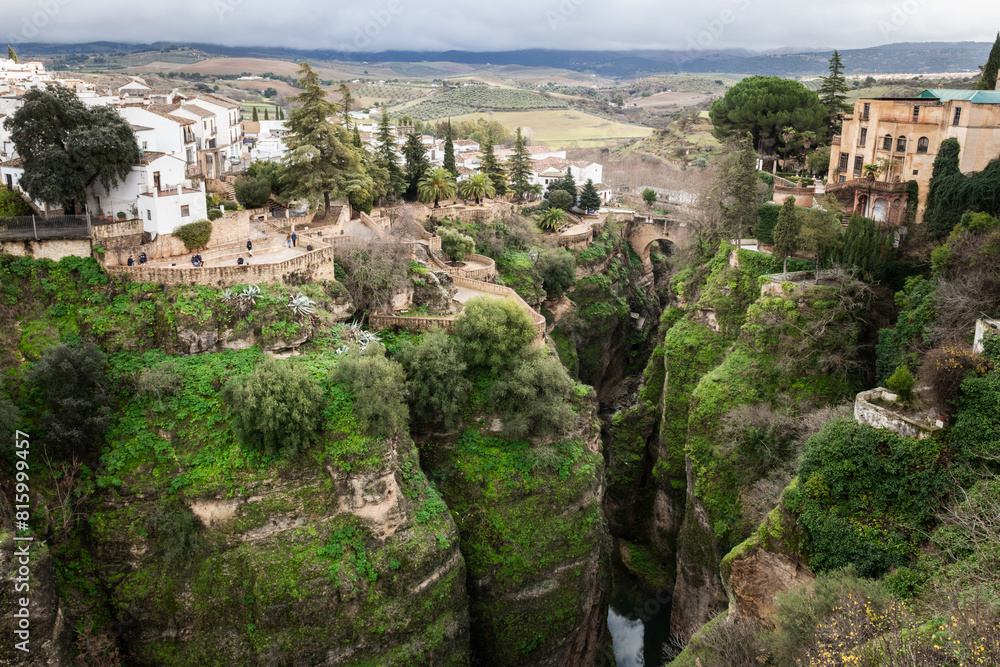 A canyon cuts through the village of Ronda, high on a mountaintop in Andalusia, southern Spain. A canyon cuts through the village of Ronda, high on a mountaintop in Andalusia, southern Spain.