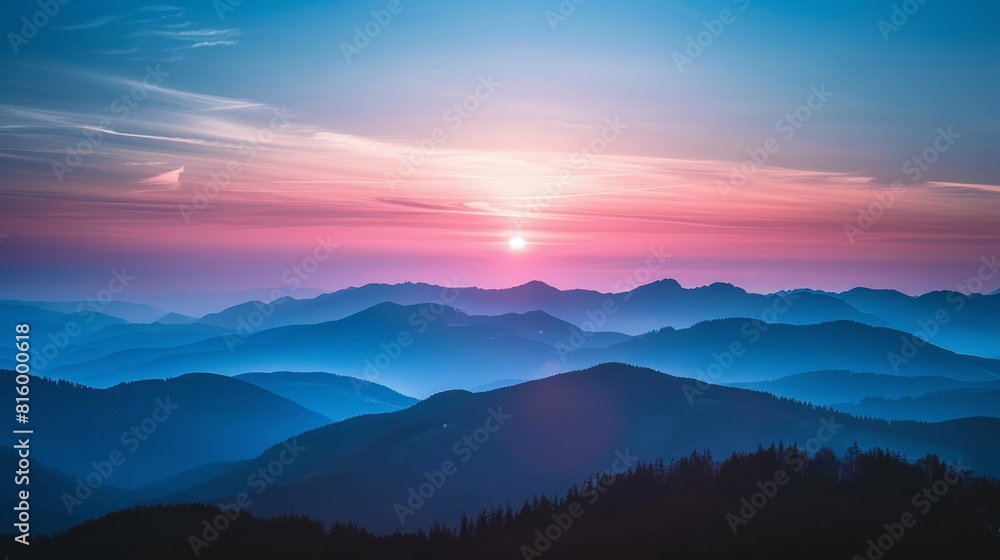 Fototapeta premium majestic sunset over silhouetted mountains landscape photography