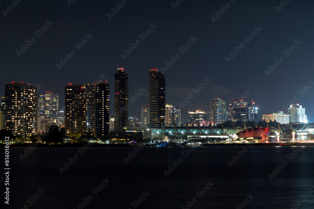 Fototapeta premium the iconic and breathtaking skyline of San Diego downtown at night. With a thousand lights on the big Towers