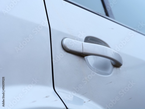 A close-up shot of a car door handle photo