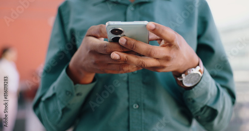 Hands, business and man with a smartphone, typing and connection with network, internet and social media. Person, closeup and employee with a cellphone, technology and mobile user with digital app