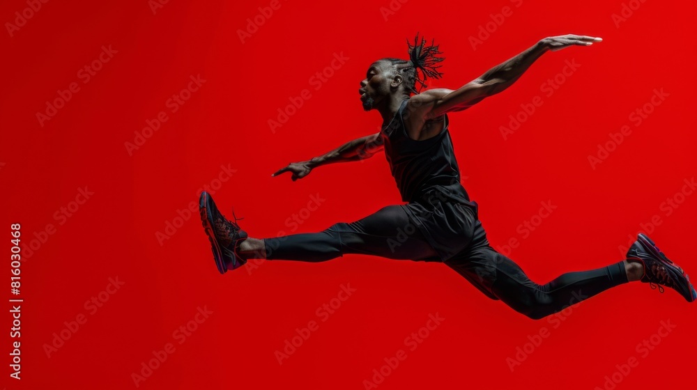 Athlete Jumping in Dynamic Motion Athlete Jumping in Dynamic Motion