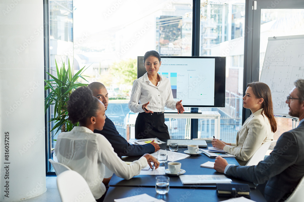 Business woman, coach and presentation with team in meeting for discussion on corporate revenue or stock at office. Female person or speaker talking to group of employees for profit or investment Business woman, coach and presentation with team in meeting for discussion on corporate revenue or stock at office. Female person or speaker talking to group of employees for profit or investment