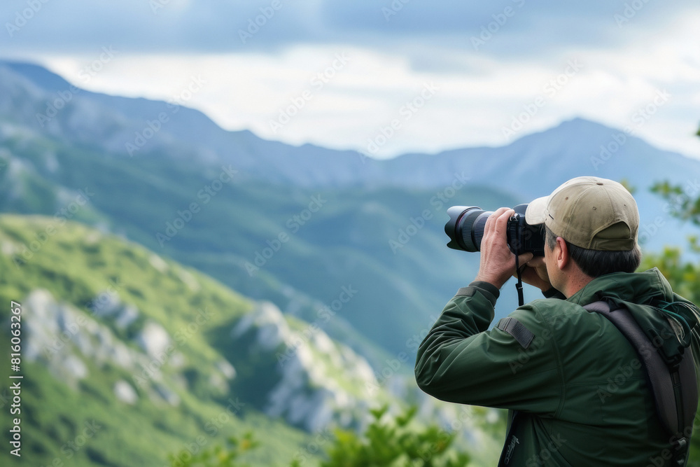 A photographer taking a landscape photo A photographer taking a landscape photo