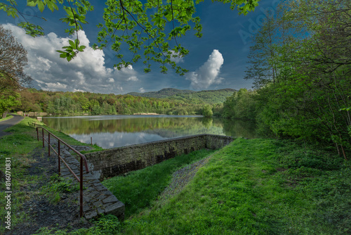 Spring blue sky day with Solcuv pond and forests near Oldrichovske saddleback photo