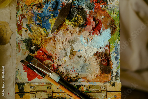 Obraz na płótnie Canvas with paints and brushes w salonie