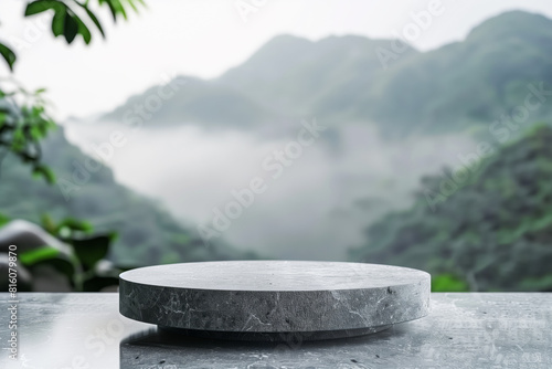 Stone podium for product presentation with mountain background