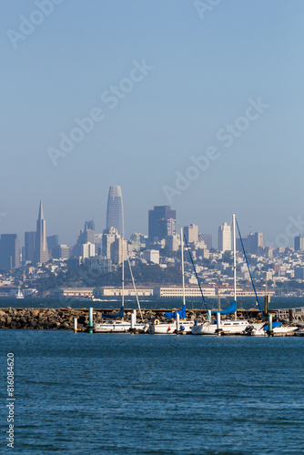view from a small bay at the Golden Gate Bridge to the cityscape of San Francisco with the high rise buildings at a clear sky morning
