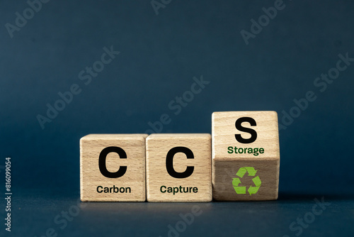 Obraz na płótnie CCS Carbon capture storage symbol. Concept words CCS Carbon capture storage,ecological icon and text on wooden blocks. navy blue background. Business eco Carbon capture storage concept. Copy space. w salonie