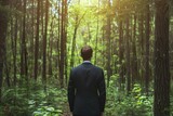 Man in a business suit stands amidst serene woodland, contemplating nature