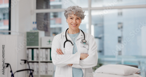 Portrait, woman and doctor with arms crossed, confidence and happiness with healthcare consultant, hospital and career. Medical professional, female person or happy lady with success, proud and smile