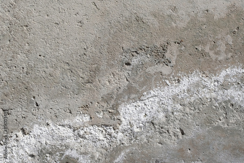 Surface of old weathered concrete wall close up