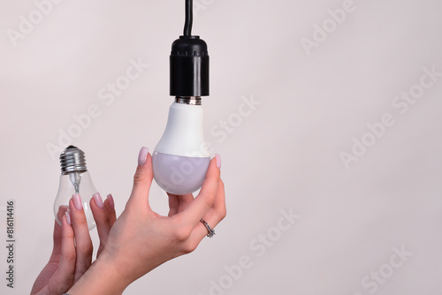 LED lamp and incandescent bulbs. In the hand