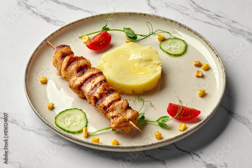 Grilled chicken skewers with mashed potatoes for kids