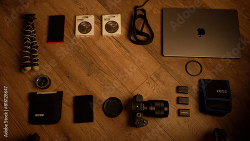 creative content camera equipment laid out on the floor 