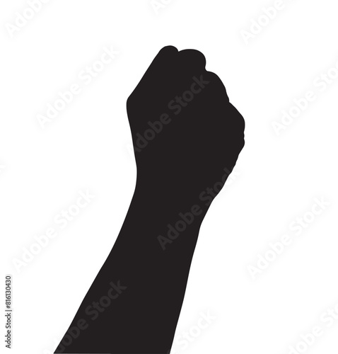 Clenched fist of a dark skin hand  male photo