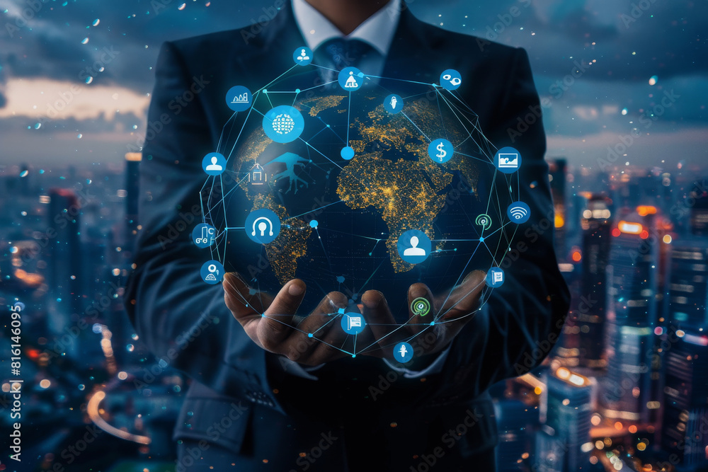A man in a suit is holding a globe with icons around it A man in a suit is holding a globe with icons around it
