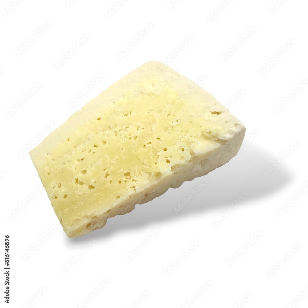 A slice of Kefalotyri cheese, isolated on white background. Kefalotyri is a hard, salty white cheese made from sheep milk or goat s milk (or both) in Greece and Cyprus. A slice of Kefalotyri cheese, isolated on white background. Kefalotyri is a hard, salty white cheese made from sheep milk or goat s milk (or both) in Greece and Cyprus.