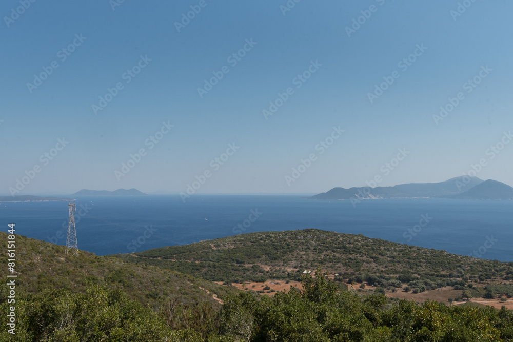 View from Agios Nikolaos Niras, Lefkada, Greece; on the left the island of Ithaca, on the right the island of Kefalonia. View from Agios Nikolaos Niras, Lefkada, Greece; on the left the island of Ithaca, on the right the island of Kefalonia.