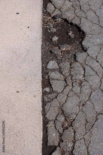 Street pavement where concrete and asphalt meet