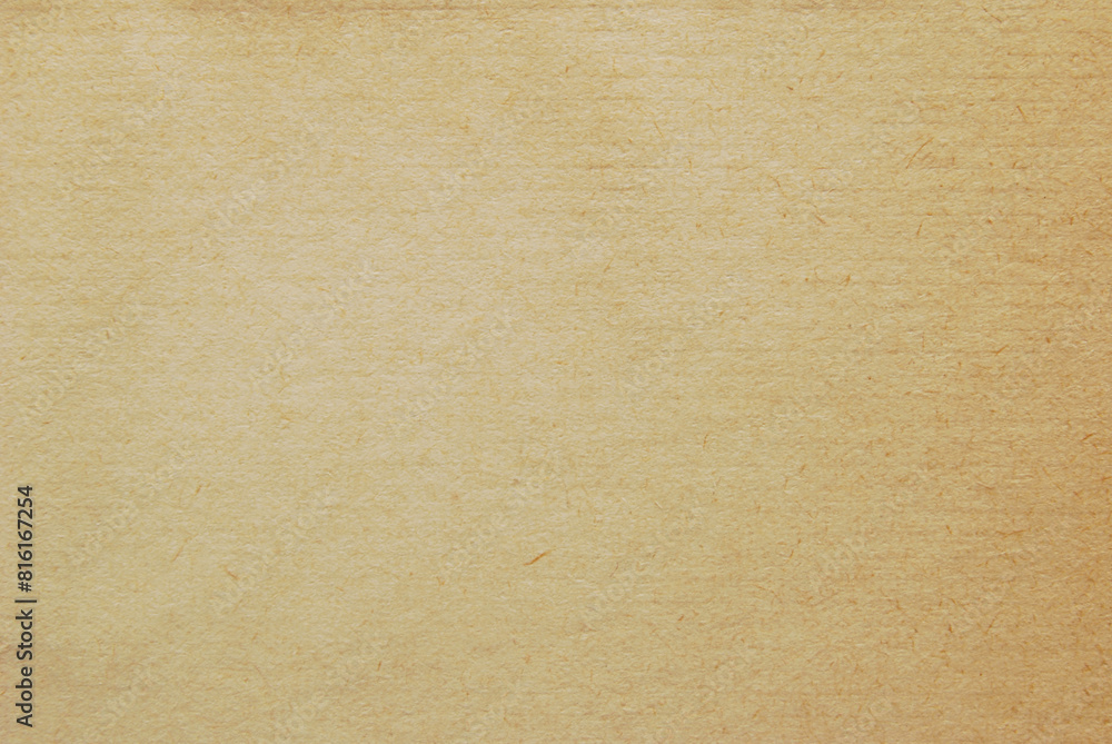 A sheet of brown recycled cardboard texture as background A sheet of brown recycled cardboard texture as background
