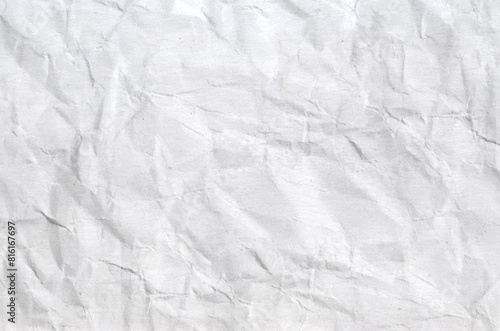 A sheet of gray wrinkled paper texture as background