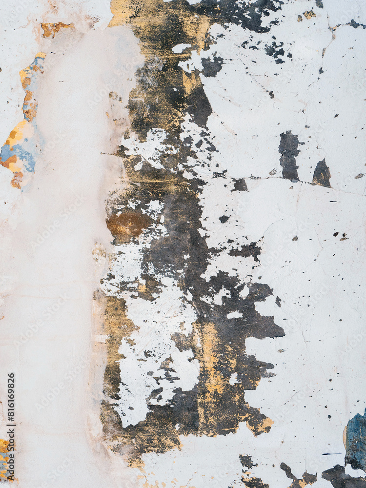 Fototapeta premium vertical surface wall is covered in cracks and has a rough texture