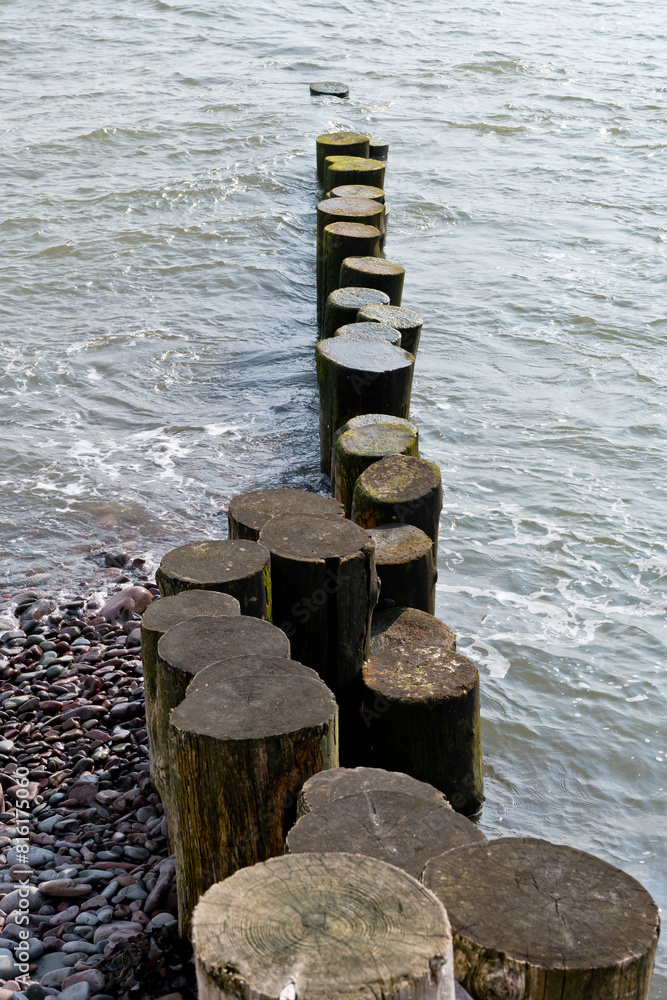 Groins on the beach at Porlock Weir, Somerset, England Groins on the beach at Porlock Weir, Somerset, England