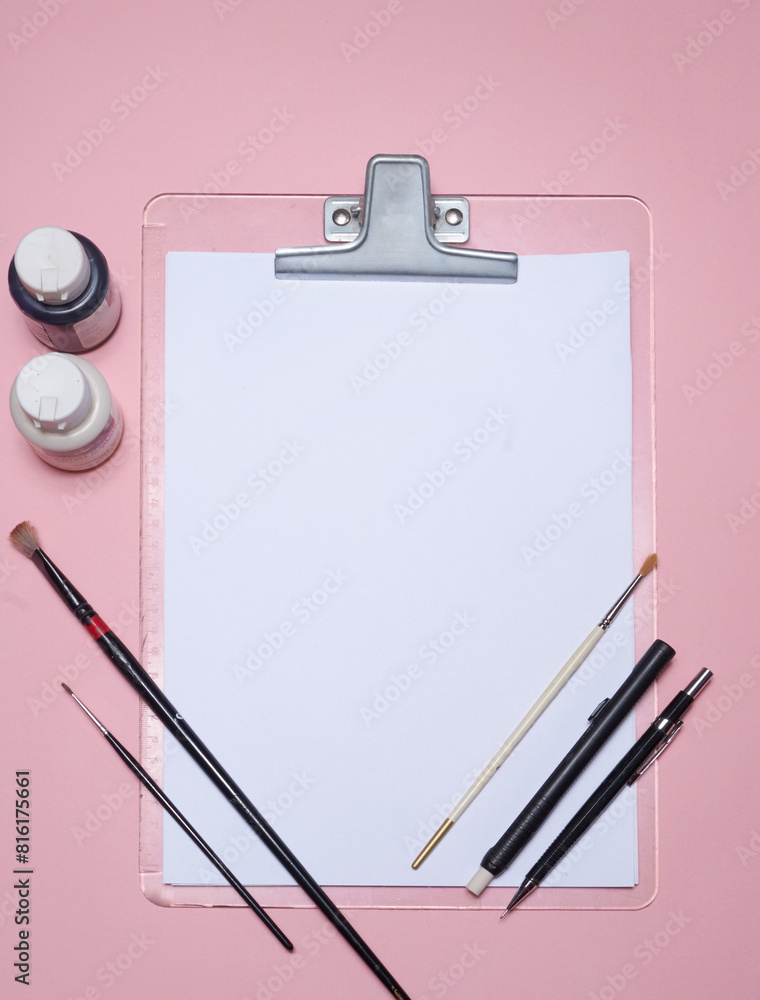 Tablet with Notepad, Pencils, and Paintbrushes: Tools for Digital and Traditional Creation Tablet with Notepad, Pencils, and Paintbrushes: Tools for Digital and Traditional Creation