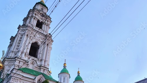 Birds flying over the domes of a Christian church. The Christian Faith. photo