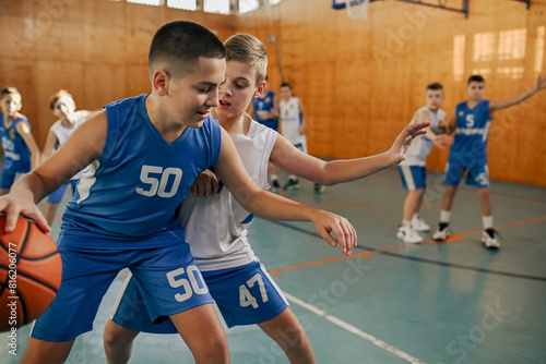 A junior basketball team is practicing game on training.