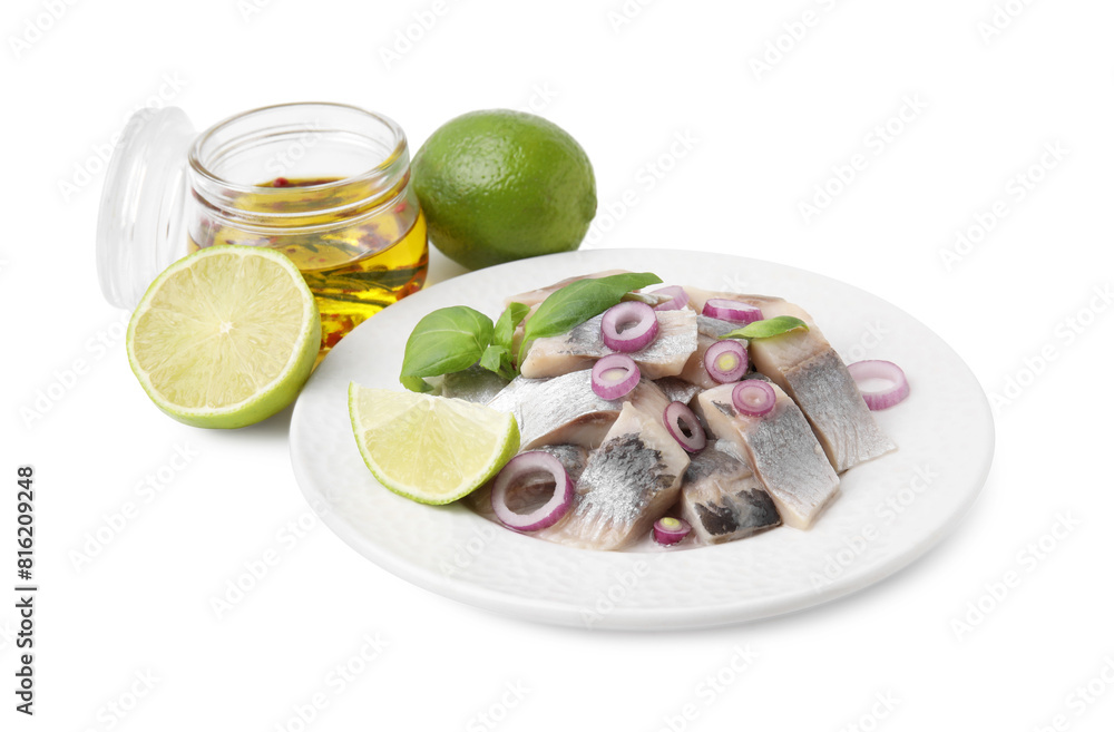 Plate with tasty fish, marinade and lime isolated on white Plate with tasty fish, marinade and lime isolated on white