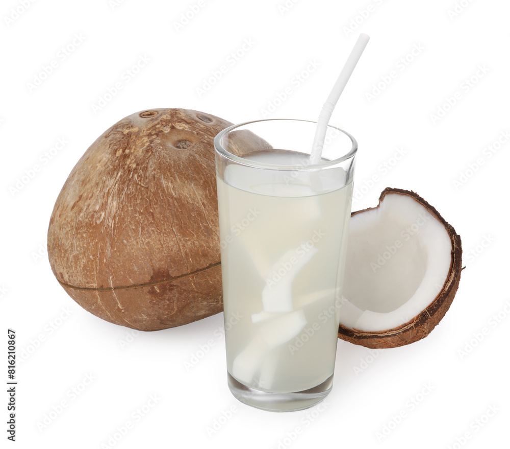 Glass of coconut water and nuts isolated on white Glass of coconut water and nuts isolated on white