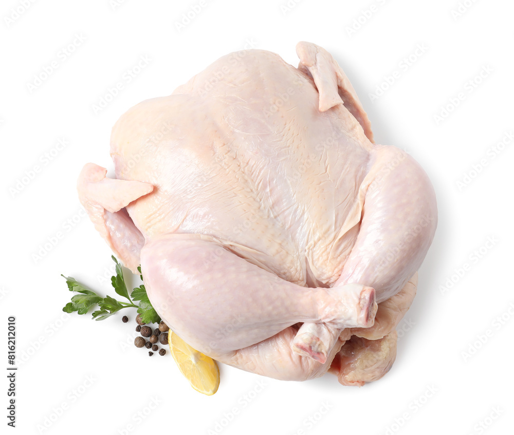 Fresh raw chicken with lemon and spices isolated on white, top view Fresh raw chicken with lemon and spices isolated on white, top view