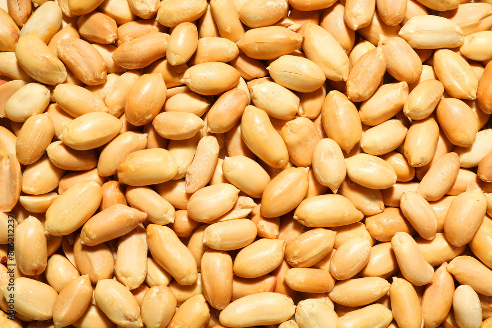 Fresh peeled peanuts as background, top view Fresh peeled peanuts as background, top view