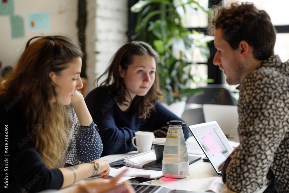 A team of business partners during a prearranged meeting. A team of business partners during a prearranged meeting.