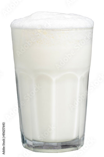 Sparkling buttermilk. Close-up. A glass of ayran isolated on white background