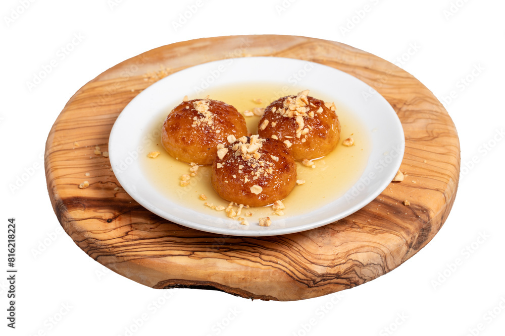 Kemalpasa dessert with milk. Turkish and Middle Eastern cuisine desserts. Ramadan meal. Kemalpaşa dessert isolated on white background Kemalpasa dessert with milk. Turkish and Middle Eastern cuisine desserts. Ramadan meal. Kemalpaşa dessert isolated on white background