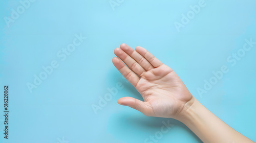 Empty hand palm of caucasian woman over pastel blue background Open hand gesture closeup Adult female person right hand macro Body parts concept Directly above view : Generative AI