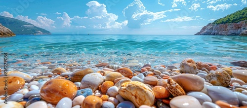 Rocky and shell-strewn beach shore photo