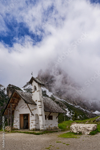 Small chapel in Falzarego pass in Dolomites. church in the mountains. Mountain chapel in Dolomites, Tre Cime di Lavaredo National Park, Italy