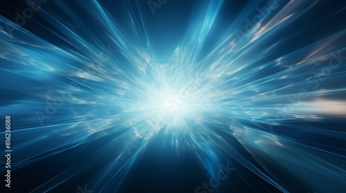 A high-resolution image of a blue burst of light in a dark background. The light is bright, and it radiates outwards in all directions. The dark background is pure and solid, visible imperfections photo