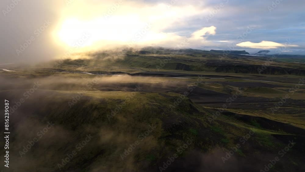 An ethereal aerial view captures the morning mist delicately rolling over the lush hills and vast valleys of Iceland, presenting a breathtaking panorama. Iceland. An ethereal aerial view captures the morning mist delicately rolling over the lush hills and vast valleys of Iceland, presenting a breathtaking panorama. Iceland.