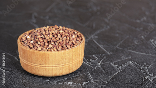 buckwheat in a wooden bowl is healthy and dietary
